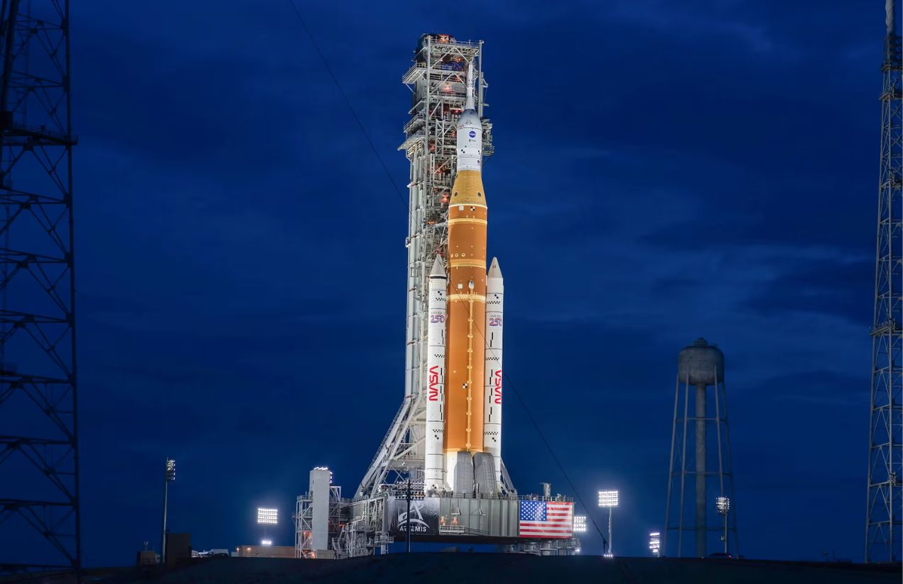 A rocket on the horizon preparing to launch into outer space