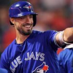 The now Yankees player happily celebrating an important home run or run with his former teammates