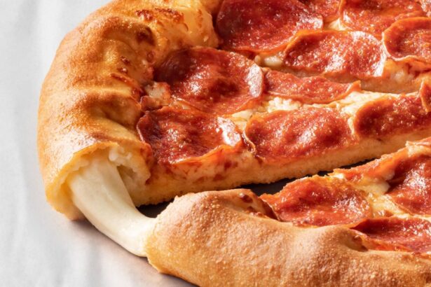 A pepperoni pizza with a cheese-stuffed crust