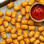 Popular frozen potato product recalled in the United States over possible contamination A table with diced cooked potatoes and a cup of ketchup on the side