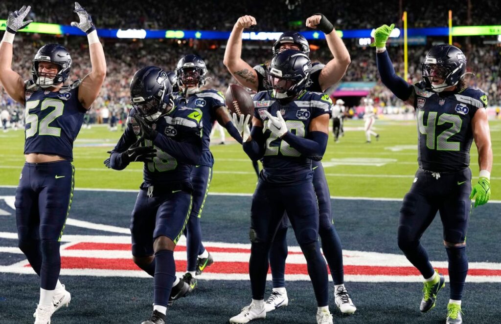 Several Seattle Seahawks players celebrating after a touchdown