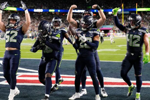 Several Seattle Seahawks players celebrating after a touchdown