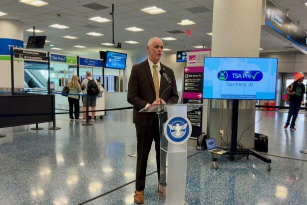One of Miami Airport’s officials speaking in front of the audience at the inauguration of this new system