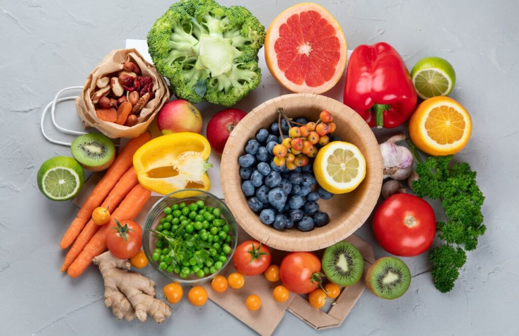 A table filled with fruits and foods rich in vitamin C