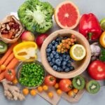 A table filled with fruits and foods rich in vitamin C