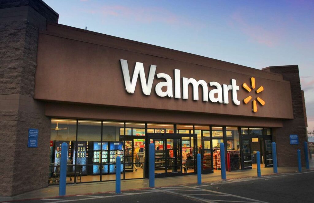 Walmart to pay $100 million after misleading delivery drivers in spark program A Walmart store shown from the front with its well-known white logo