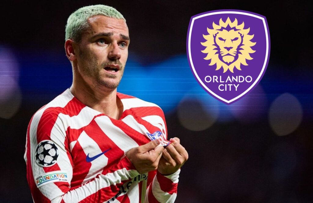 The famous French player kissing the crest on his jersey, with the purple crest of Orlando City SC next to him