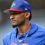 The well-known player wearing his team’s blue uniform before entering the field