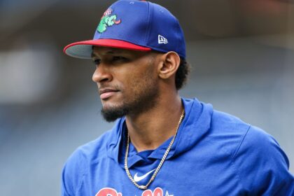 The well-known player wearing his team’s blue uniform before entering the field