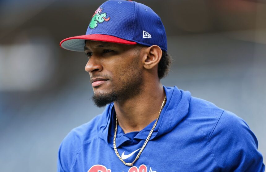 The well-known player wearing his team’s blue uniform before entering the field