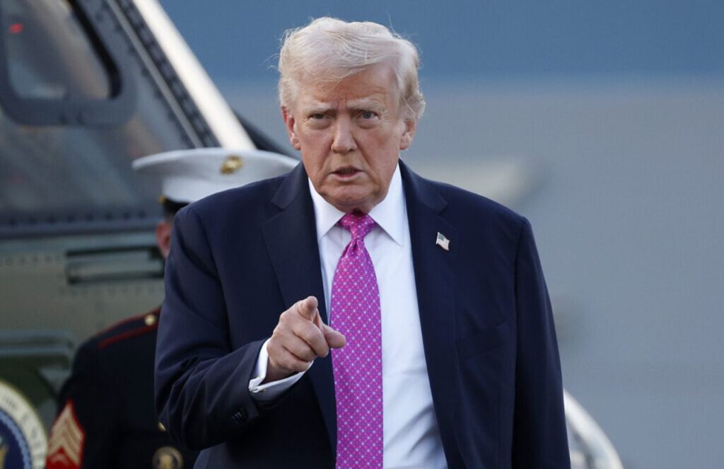 Donald Trump angry, pointing at someone during a meeting