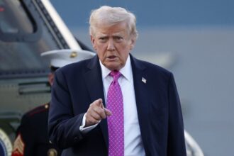 Donald Trump angry, pointing at someone during a meeting