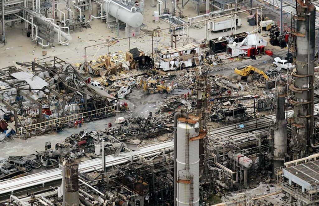 Destruction, chaos, and many burned and charred objects after the massive fire that occurred at the refinery