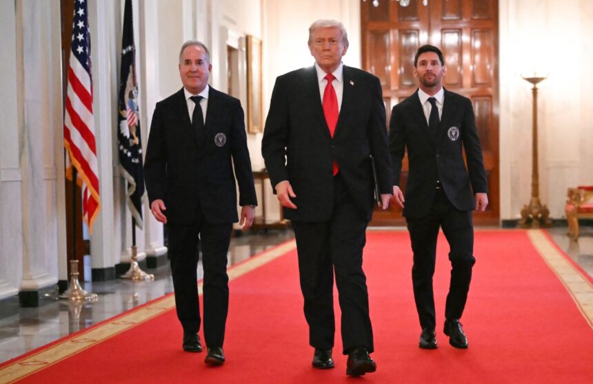 Trump giving Messi and another Inter Miami representative a tour of the White House while they wear elegant suits