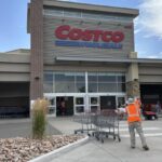 A Costco store seen from the outside with its iconic red color