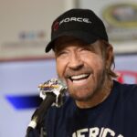 The legendary actor smiling brightly during an interview at an autograph signing event