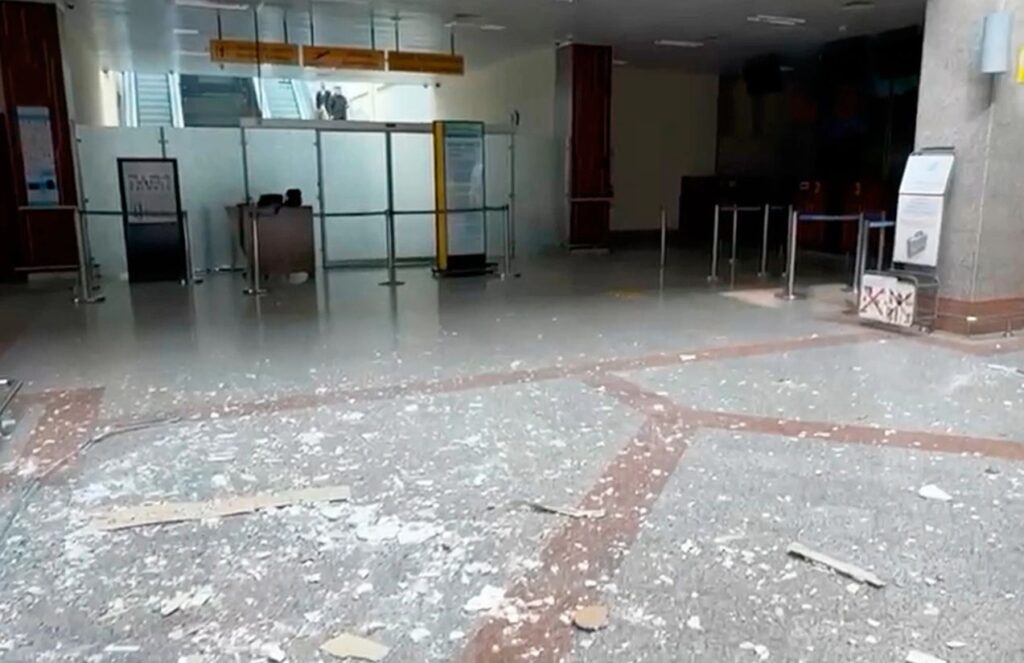 One of the sections of the airport with the roof destroyed and lying on the ground