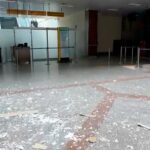 One of the sections of the airport with the roof destroyed and lying on the ground