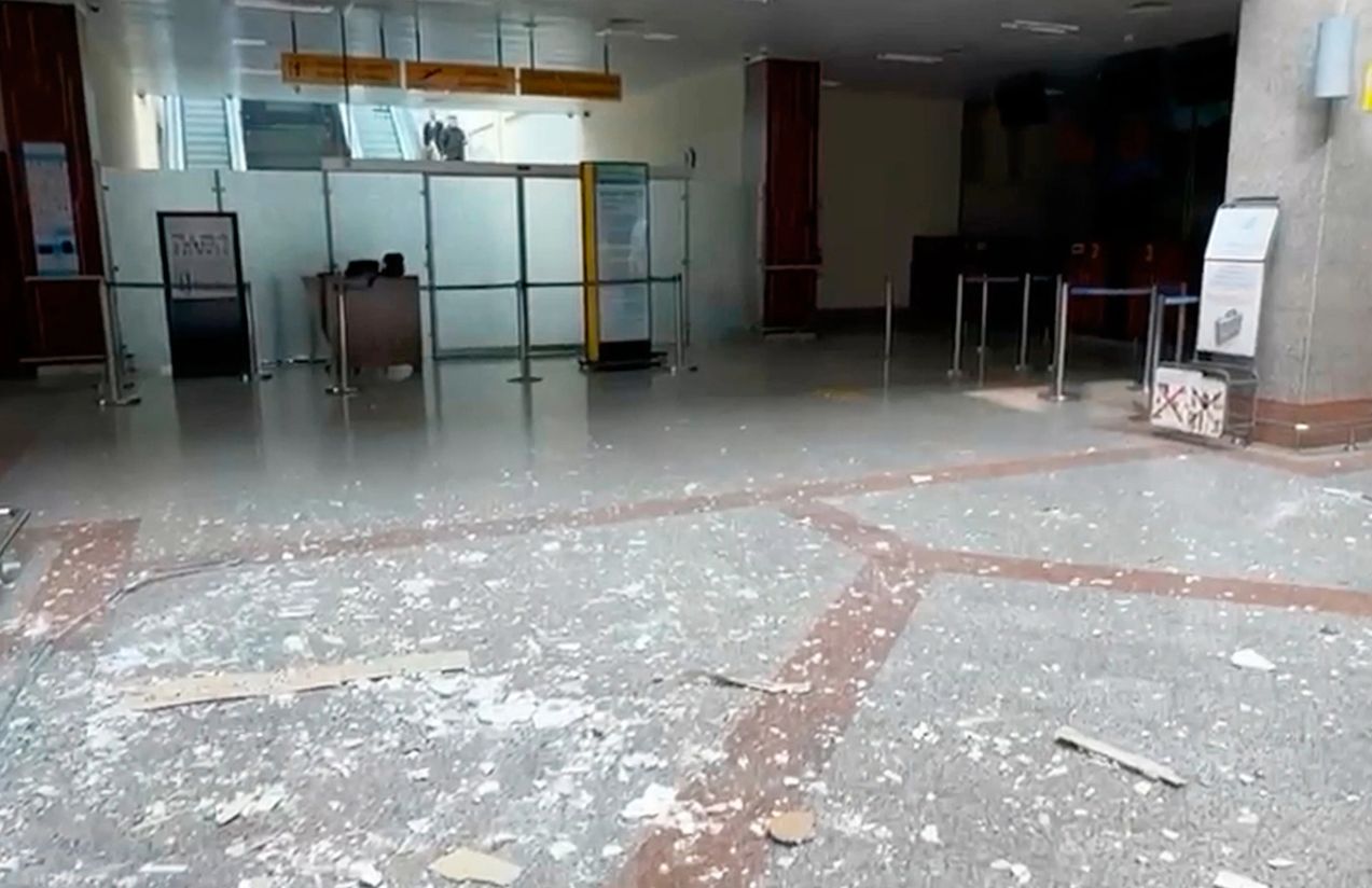 One of the sections of the airport with the roof destroyed and lying on the ground