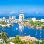 a panoramic photo of Florida with its palm trees, houses, and beautiful buildings