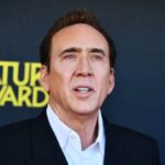 The legendary actor wearing an elegant suit on the red carpet