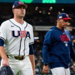 Skubal leaving the field with one of his coaches after delivering a magnificent performance with Team USA