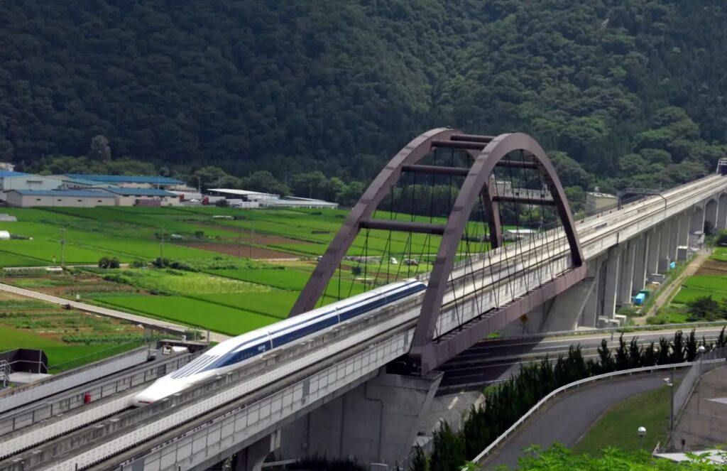 The fastest train in the world: Japan speeds into the future at 600 km/h A train passing over a bridge in Japan
