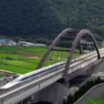 A train passing over a bridge in Japan