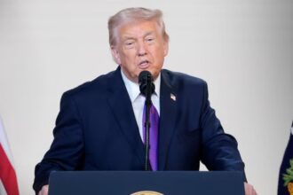 Donald Trump speaking seriously in front of the cameras following the situation in the Middle East