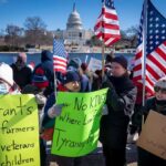 Hundreds of protesters in the streets of the United States marching for workers’ rights and better jobs