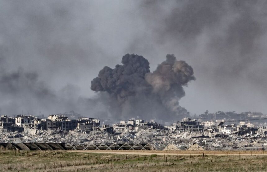 A war zone with heavy destruction and explosions everywhere