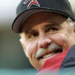 The MLB legend looking toward the horizon while smiling