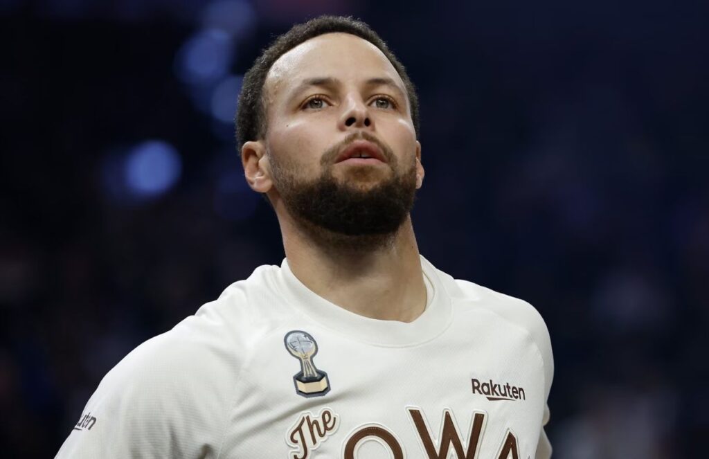 Concern for the Golden State Warriors as Stephen Curry will play under minutes restriction in crucial game vs. the Los Angeles Clippers Stephen Curry on the court looking toward the stands while warming up for the game.