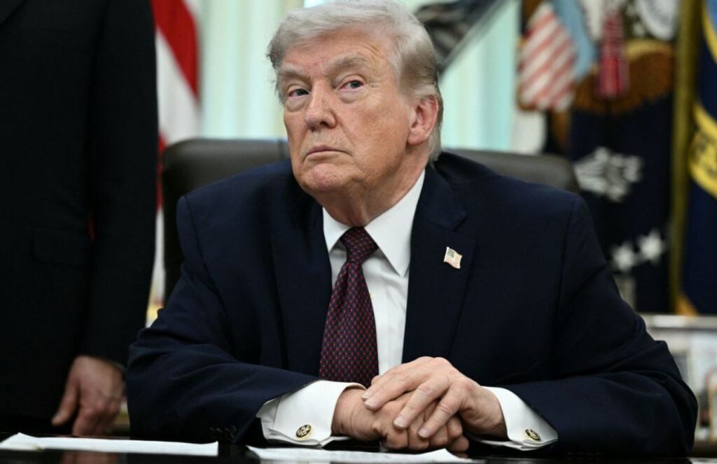 Donald Trump reveals rescued airman in Iran is seriously injured after extreme mission Trump with a very angry expression while looking at someone in the audience during a speech