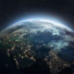 Earth seen from space, showing some continents and the lights of its cities.