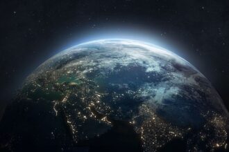 Earth seen from space, showing some continents and the lights of its cities.
