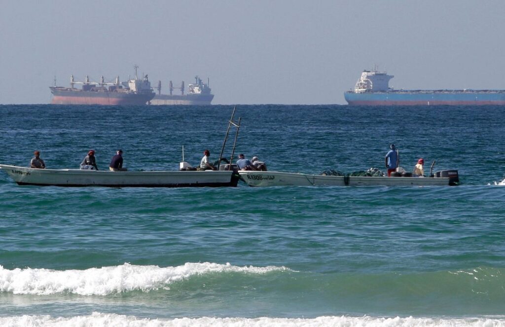 Several vessels in the open sea waiting to be received at the ports.