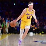 Reaves dribbling the ball during a game while attacking