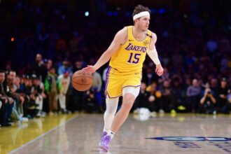 Reaves dribbling the ball during a game while attacking