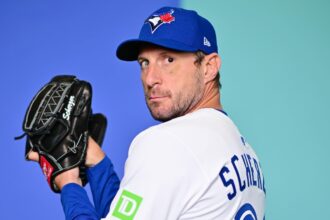 Max Scherzer posing for the cameras during a photo session for his team.
