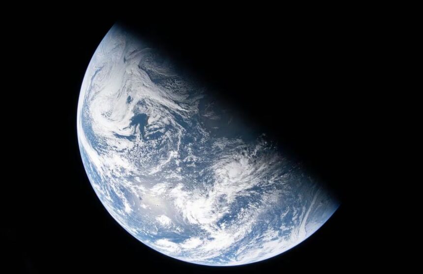 A photo of planet Earth showing the transition between night and day