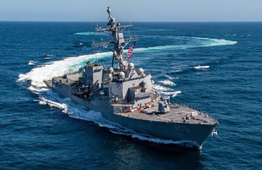 A U.S. warship sailing in the open sea.