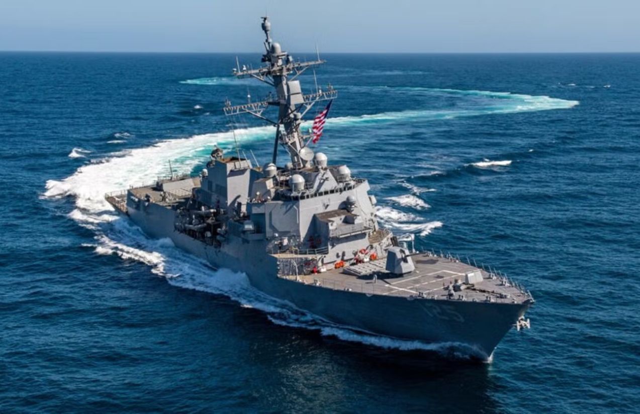 A U.S. warship sailing in the open sea.