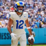 The Rams wide receiver holding the ball while walking with style after scoring