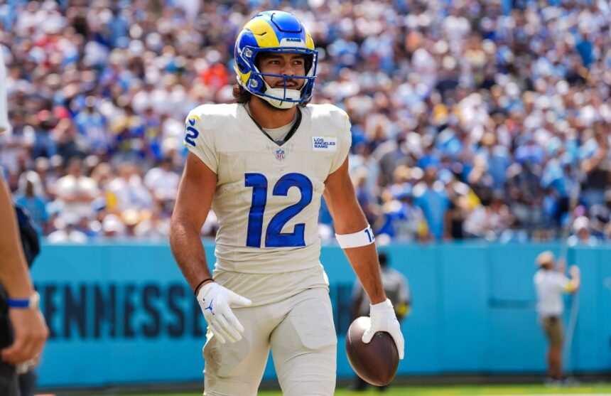 The Rams wide receiver holding the ball while walking with style after scoring