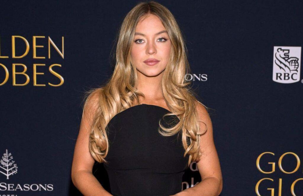 Sydney Sweeney under fire for her controversial scene dressed as a baby The young and glamorous actress posing on the red carpet in a beautiful black dress
