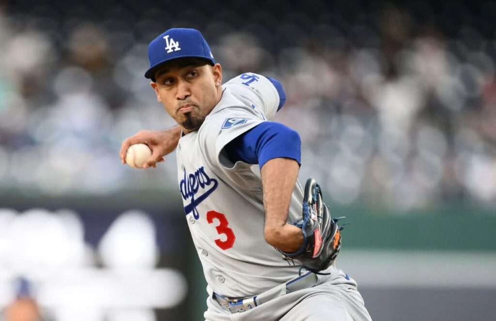 Díaz on the mound, about to throw the ball during a game.