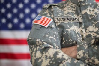 A person wearing a United States Armed Forces uniform