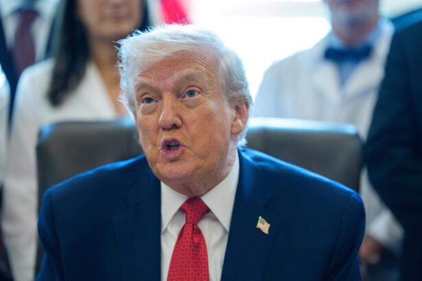 Donald Trump speaking with his supporters while sitting in his office