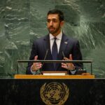 A representative of the United Arab Emirates standing at a podium presenting his point of view